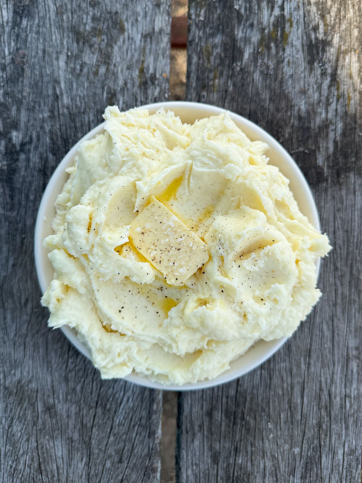 mashed potatoes topped with butter
