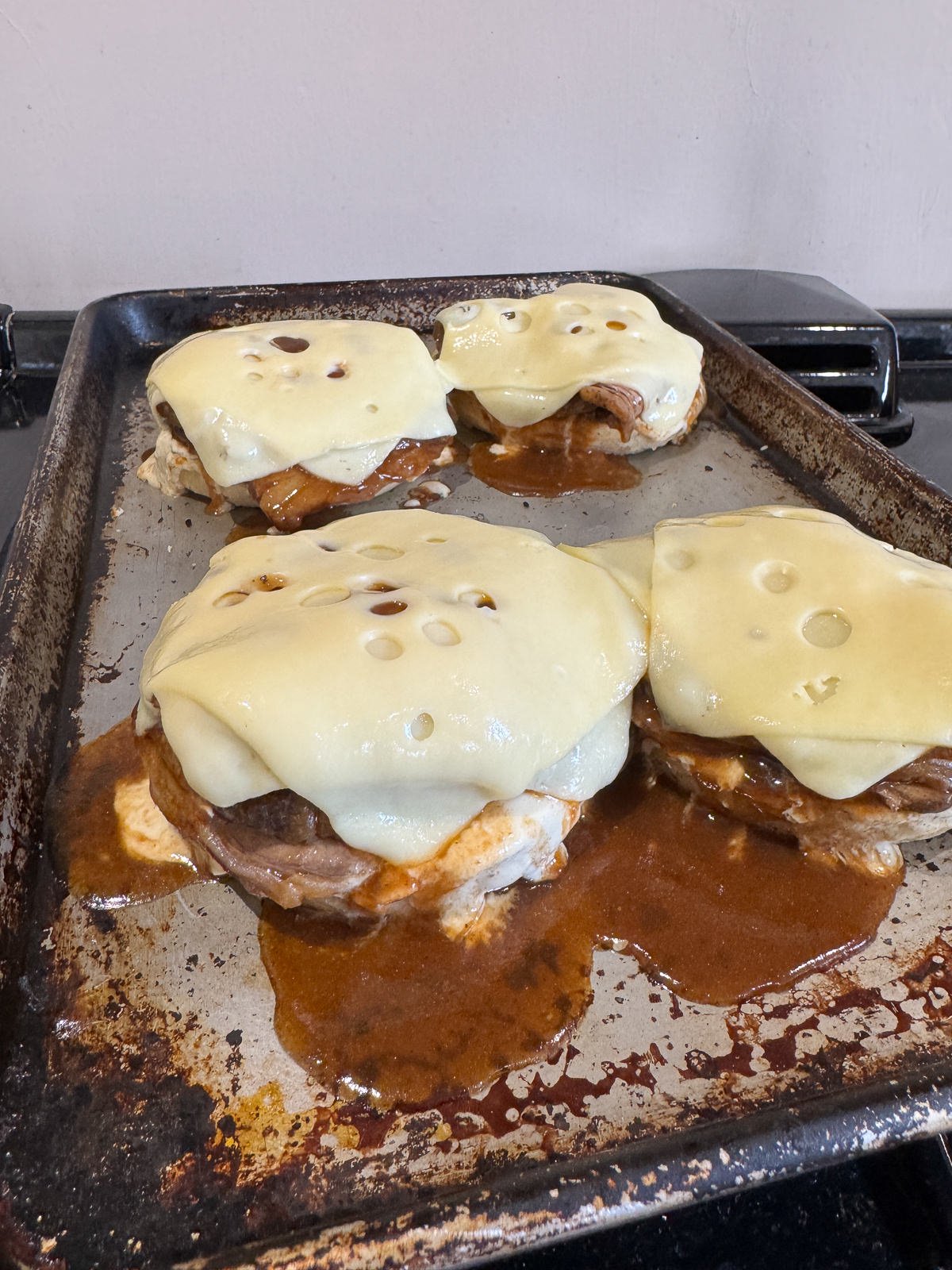 melted Swiss cheese on roast beef