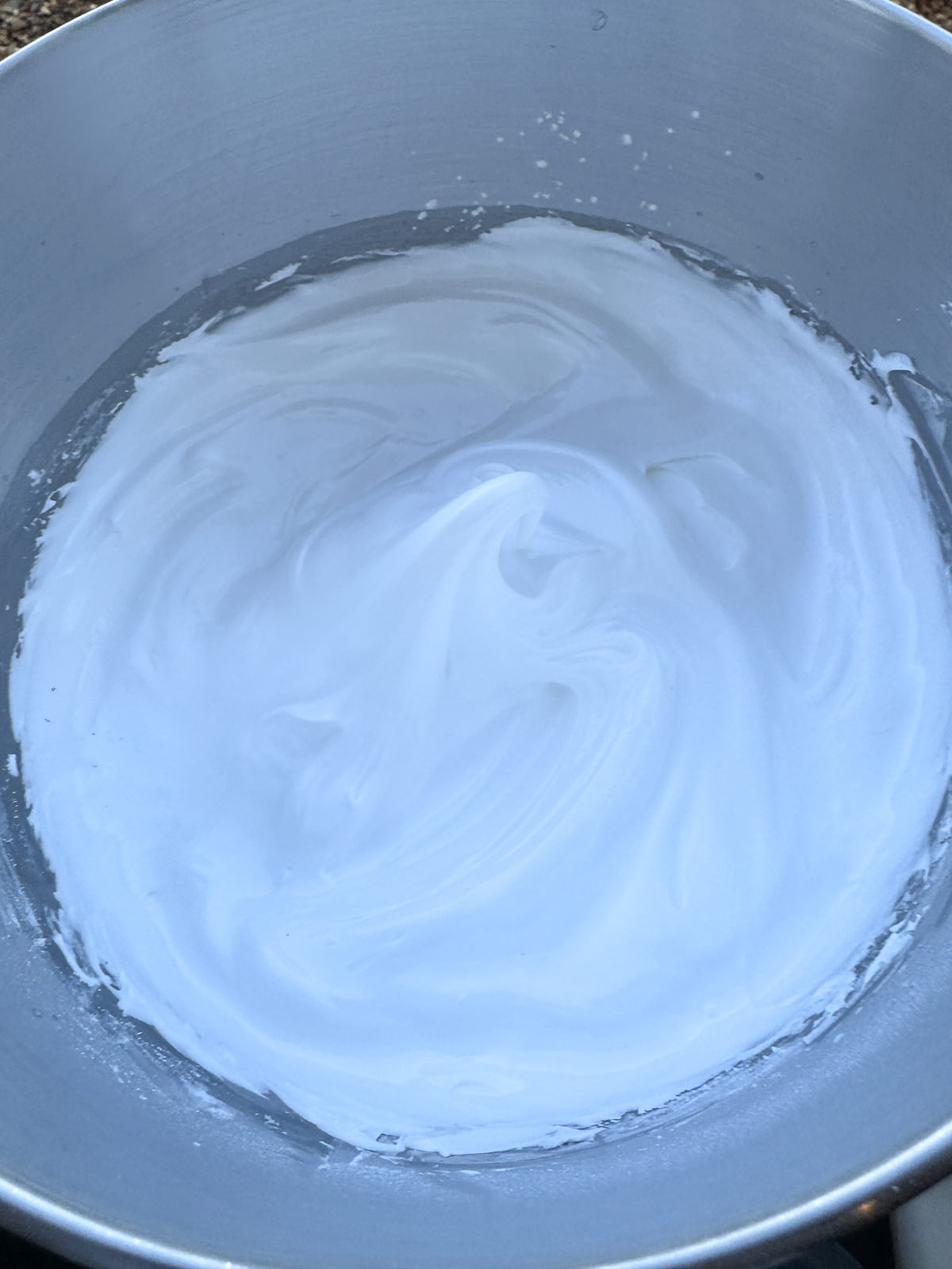 meringue whisked to stiff peaks in stand mixer