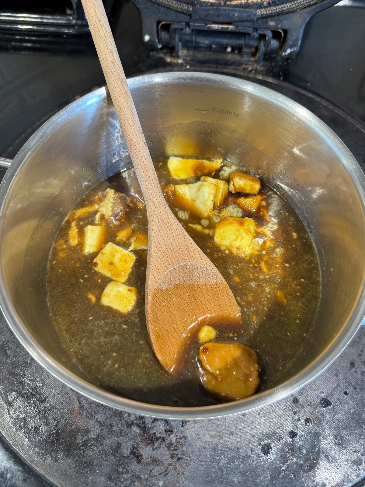 miso toffee glaze cooking in pan