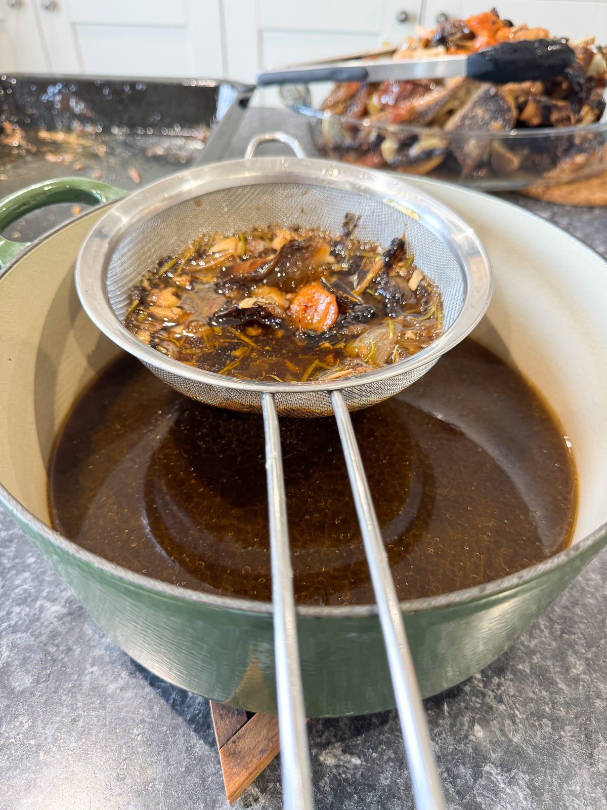 passing stock into saucepan