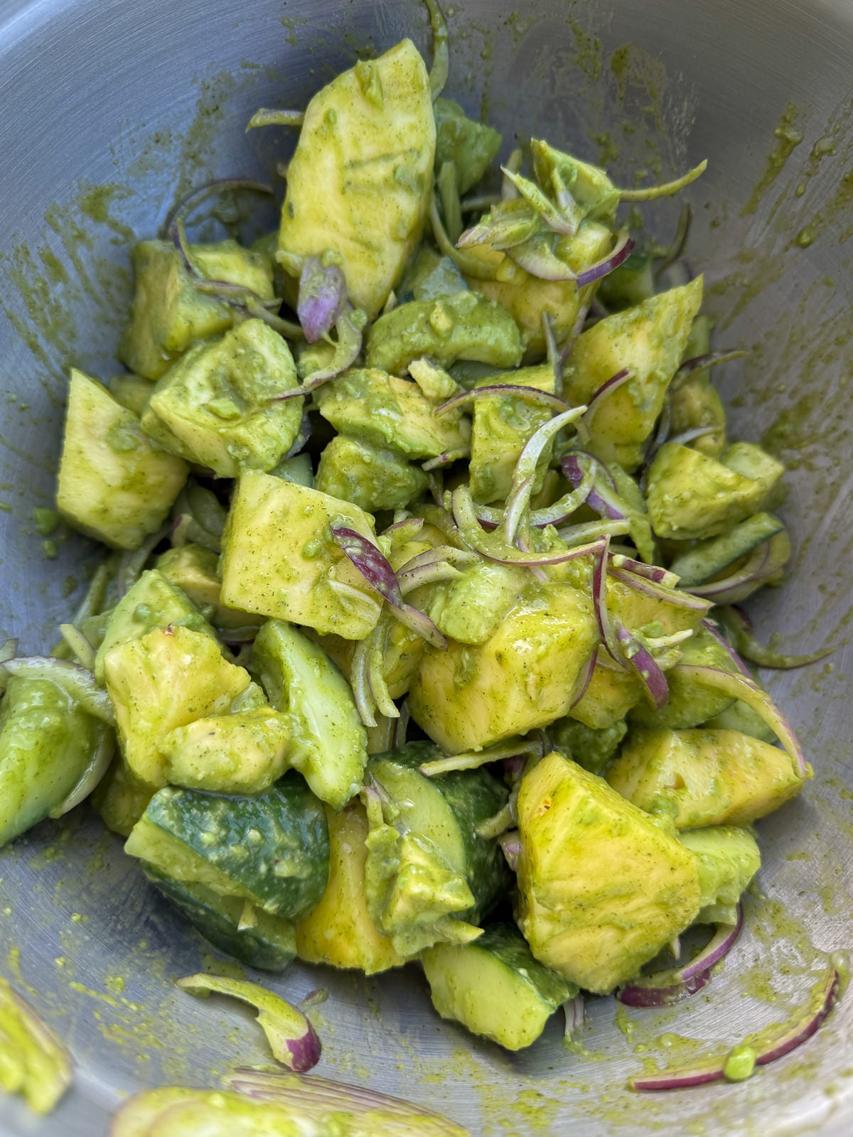 pineapple salad dressed in mixing bowl