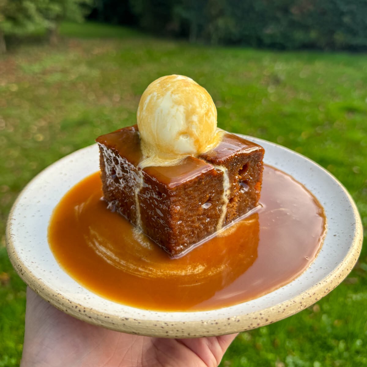 pumpkin spice sticky toffee pudding with rum caramel sauce