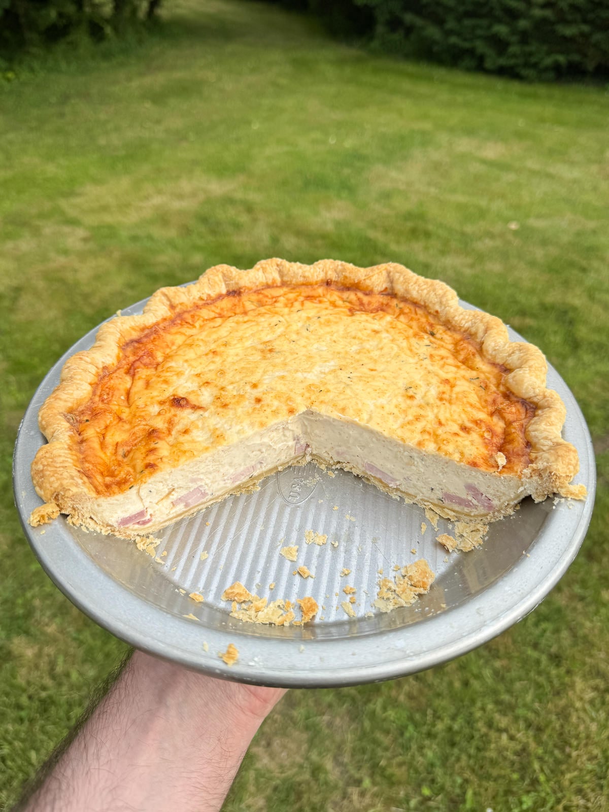 slices taken out of homemade quiche
