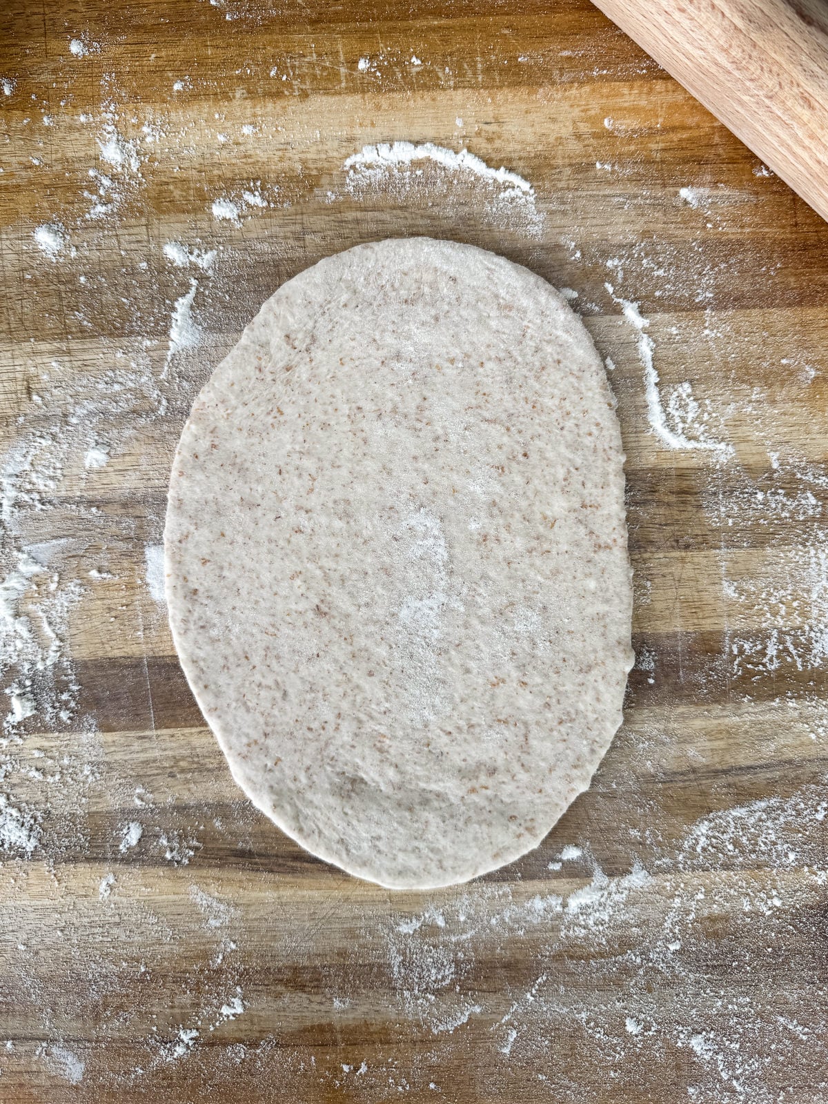 rolled out pita dough