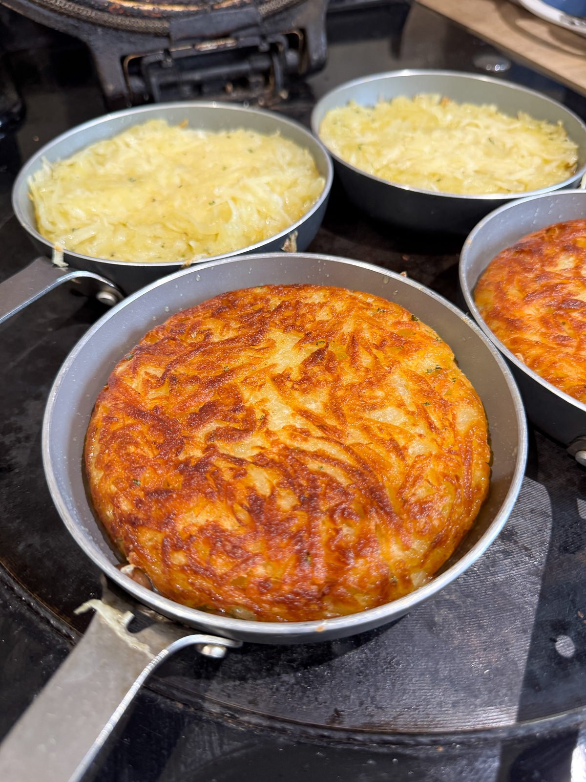 fried potato rosti flipped over