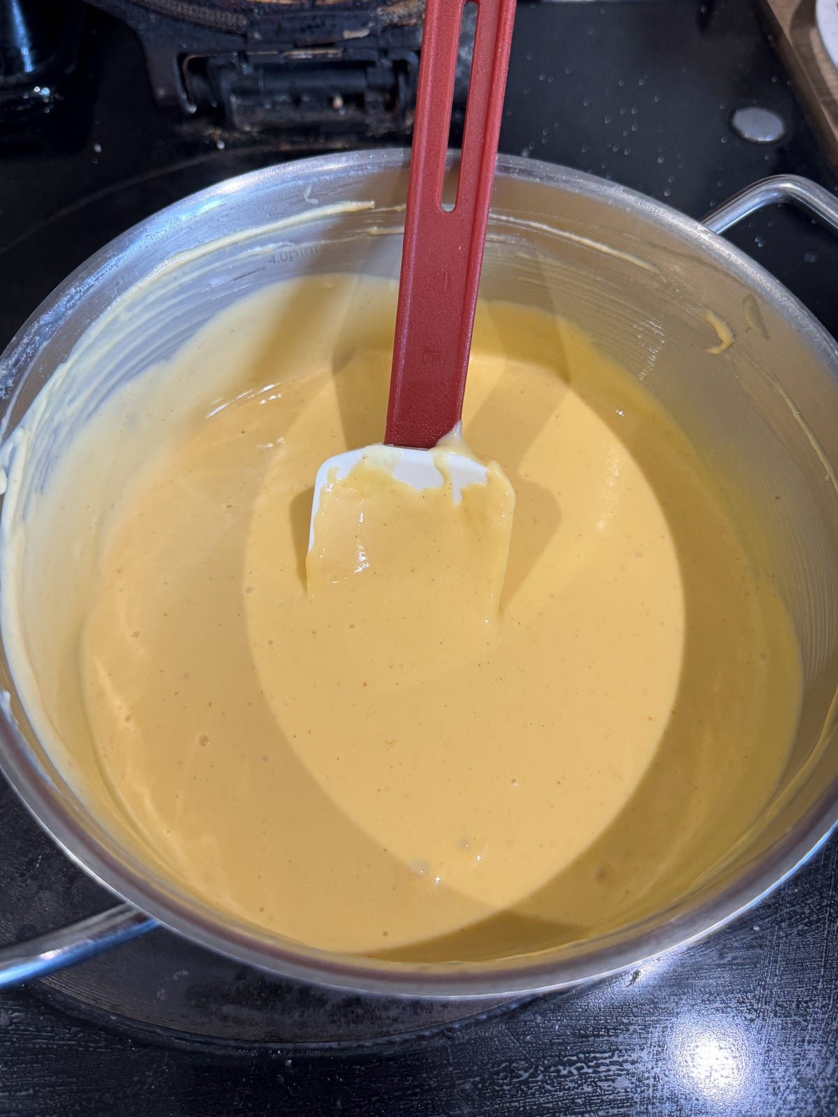 pan of cheese sauce for nachos