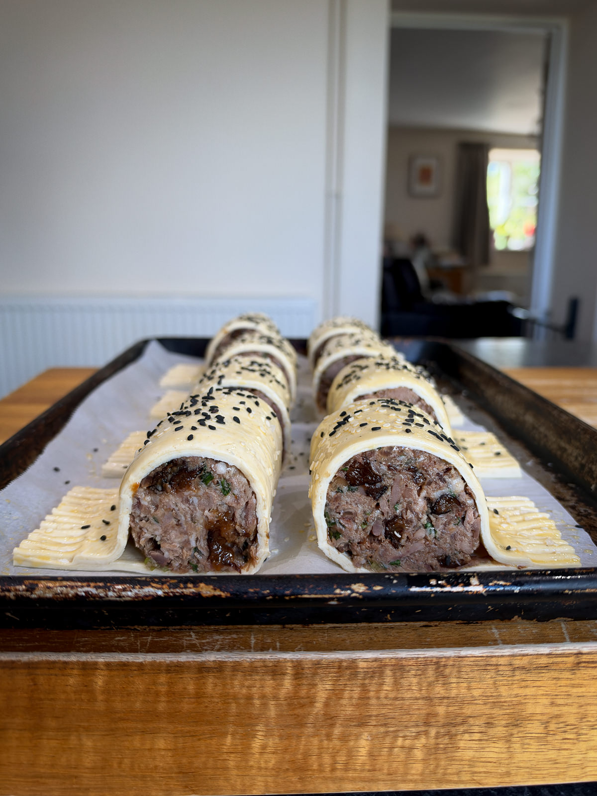 sesame topped sausage rolls