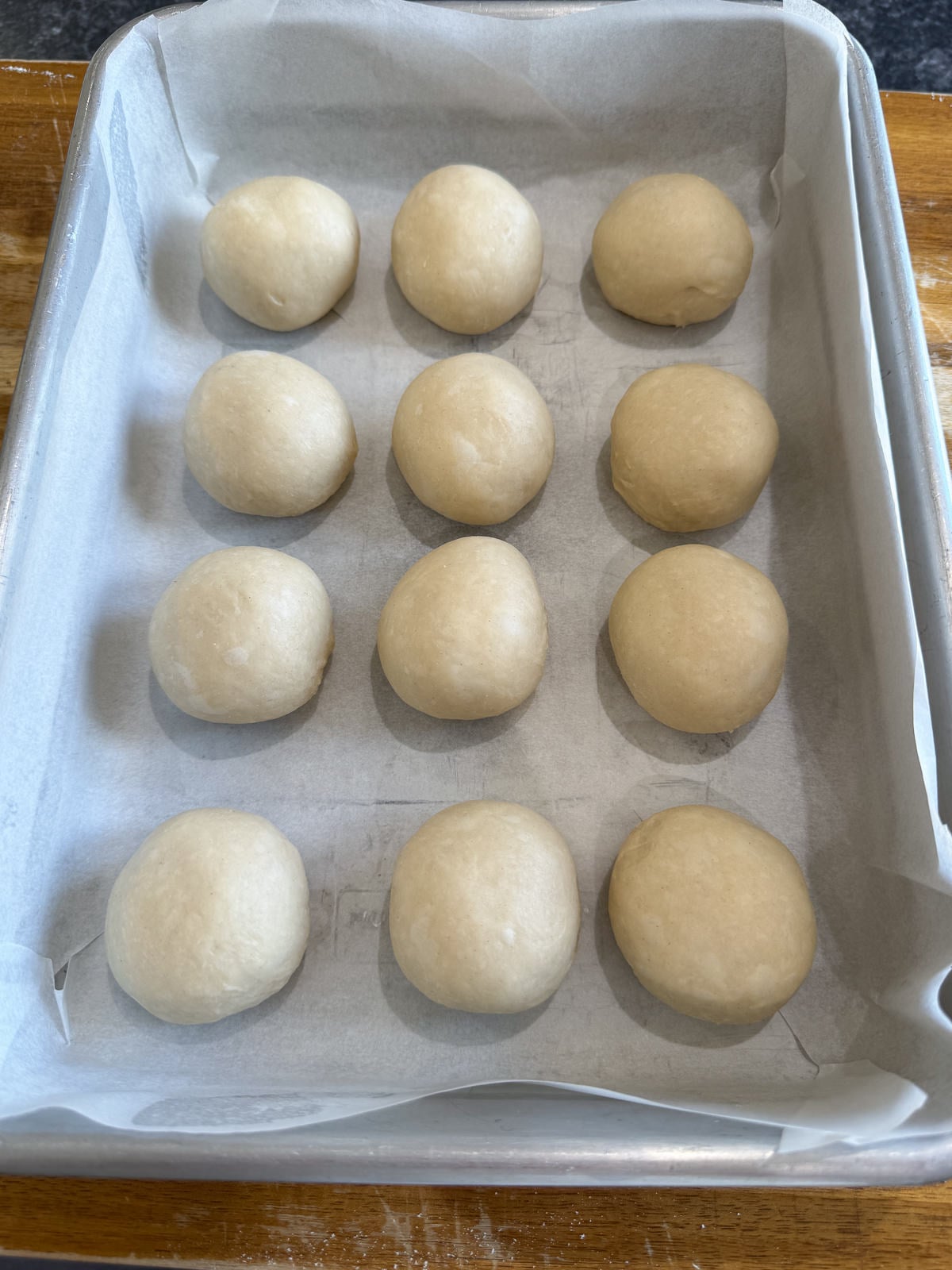 dough balls spaced in tray