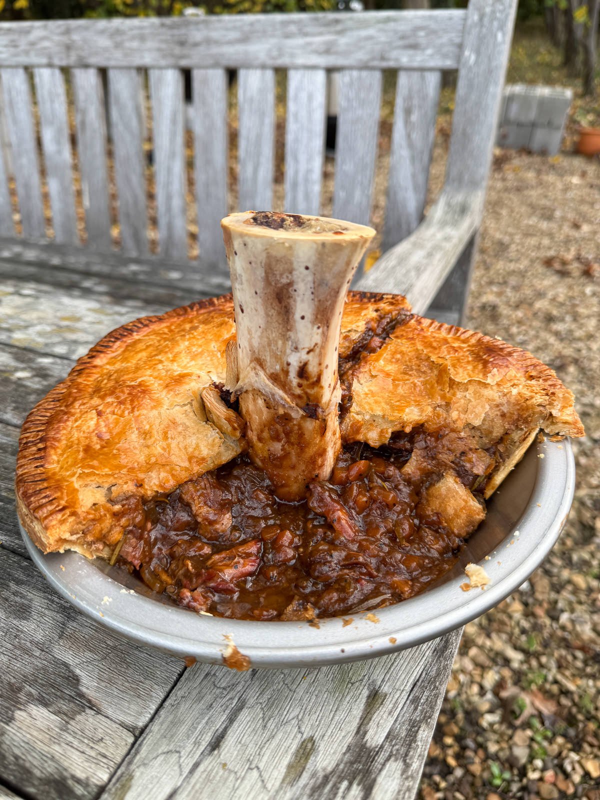 Guinness short rib pie filling under pastry