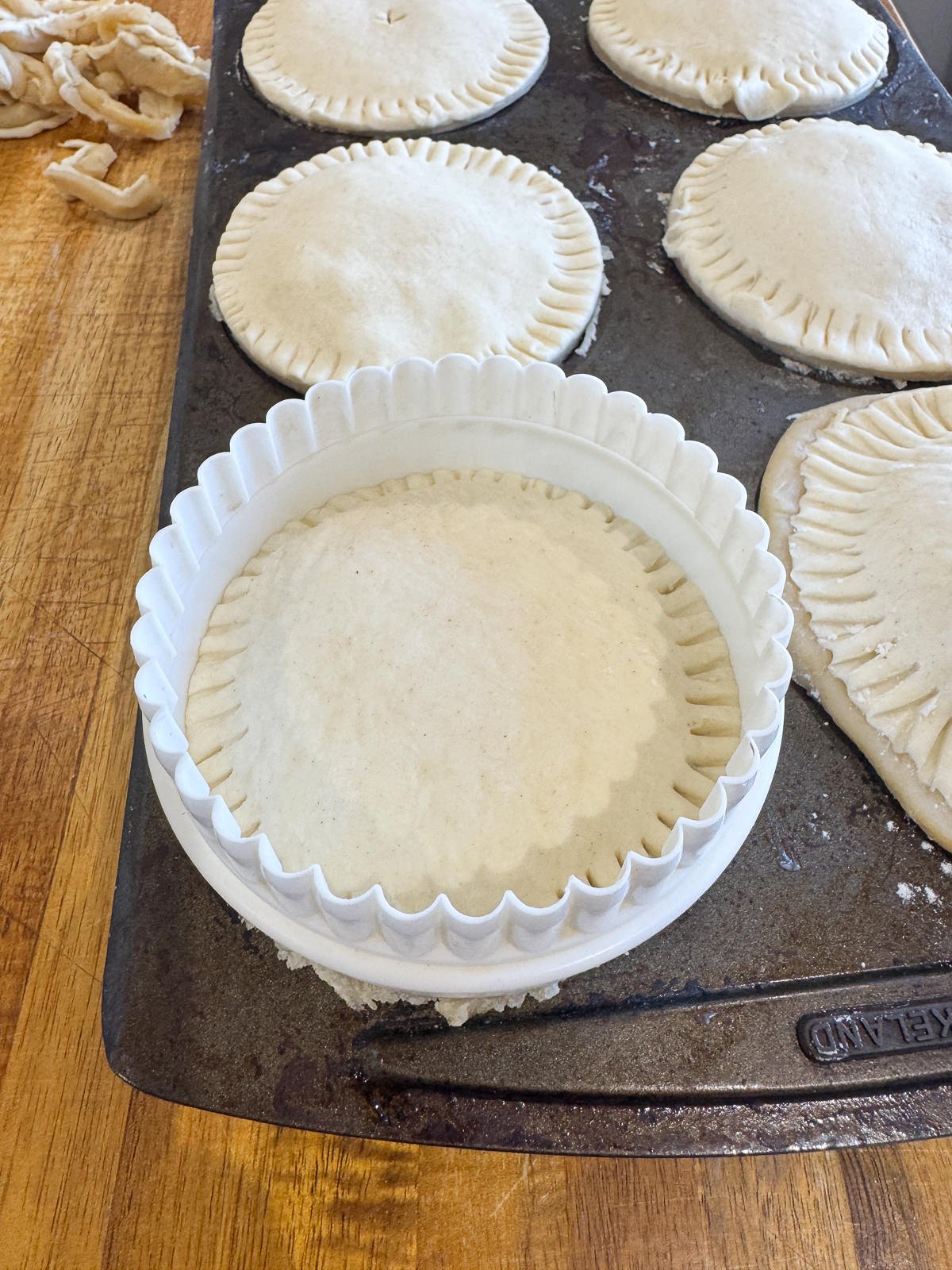 trimming pie top with round cutter