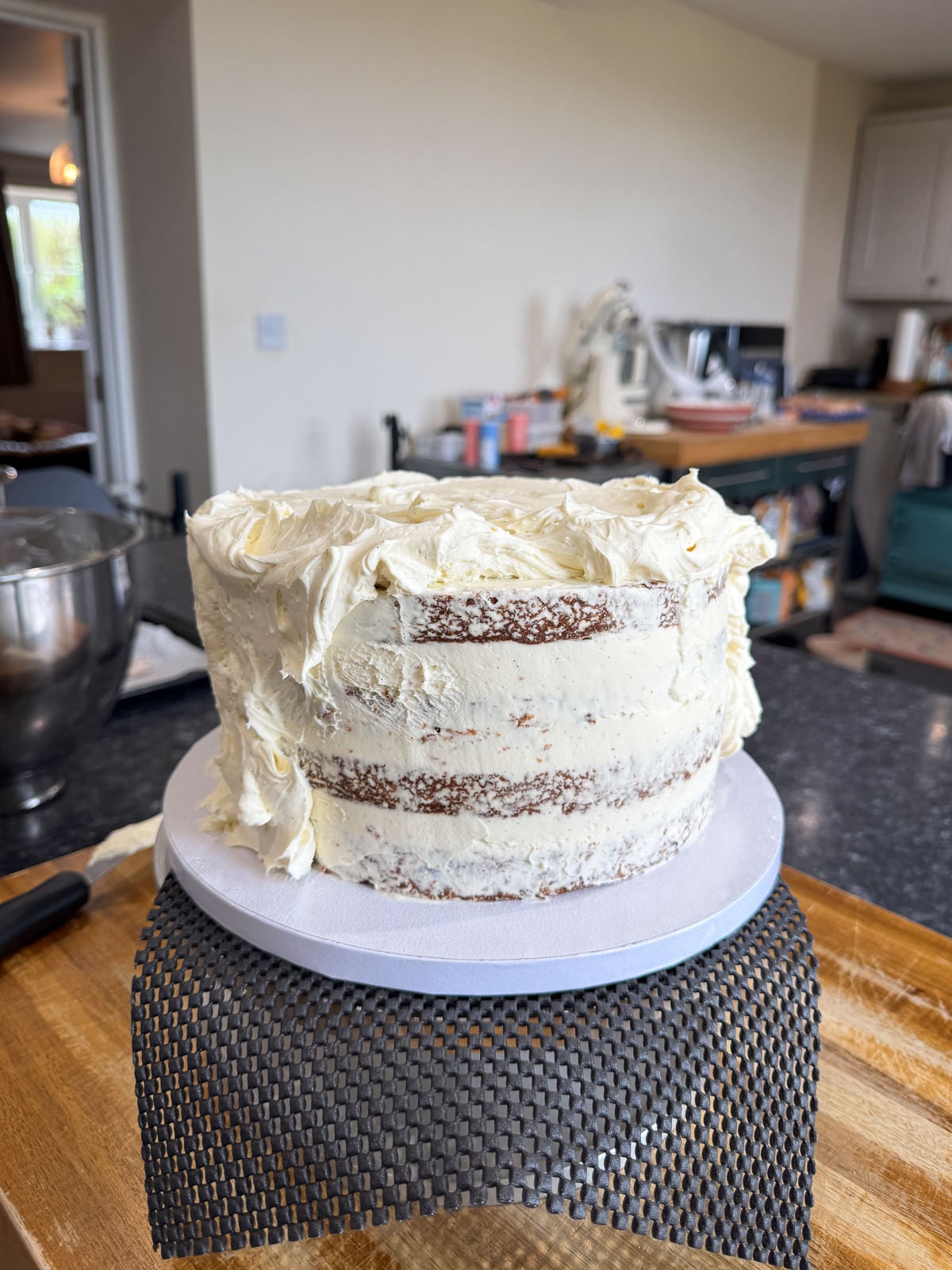 whipped cream cheese frosting on layer cake