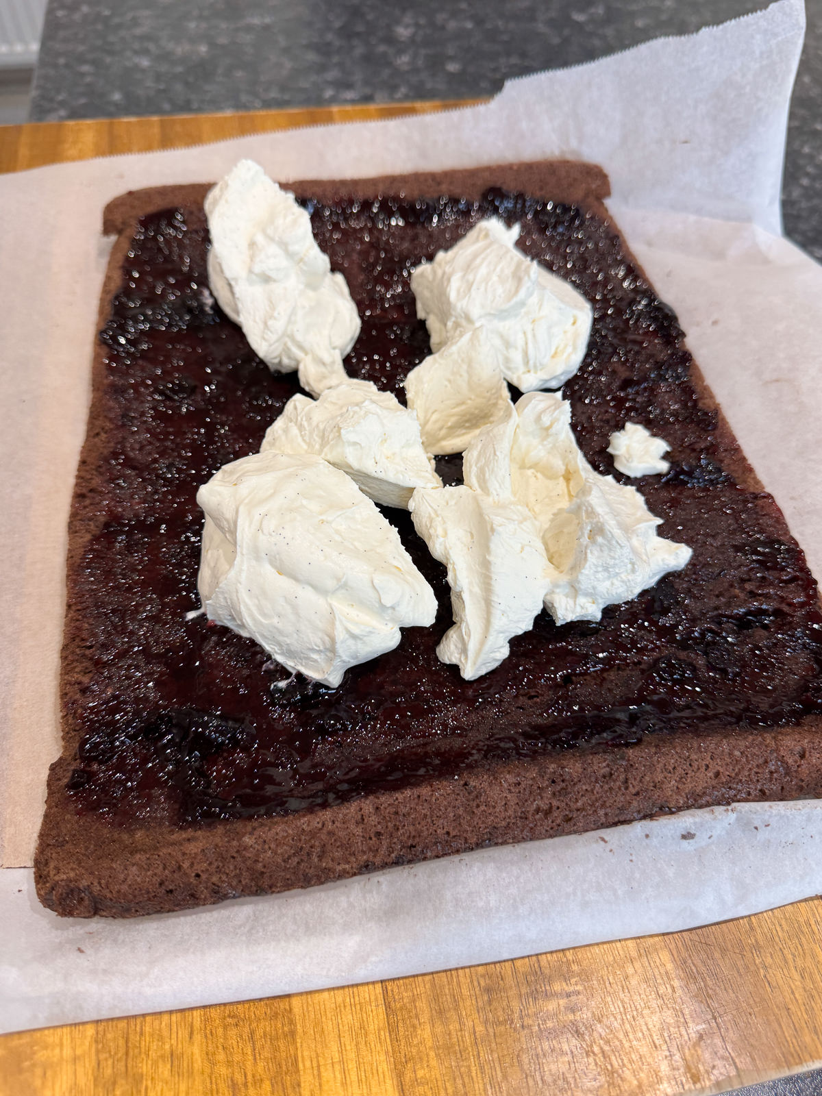 dollops of whipped cream for even layer