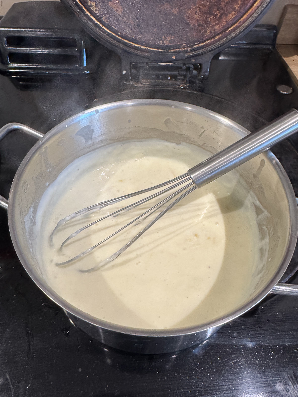white pizza sauce in pan
